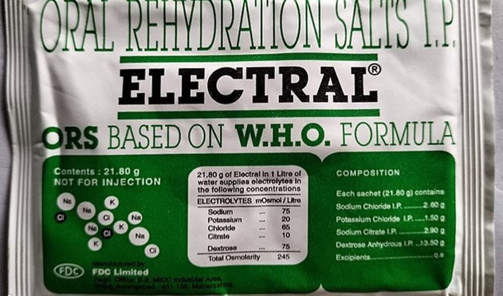 ORS packet and glass of water representing Oral Rehydration Solution