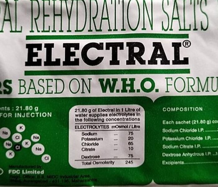 ORS packet and glass of water representing Oral Rehydration Solution