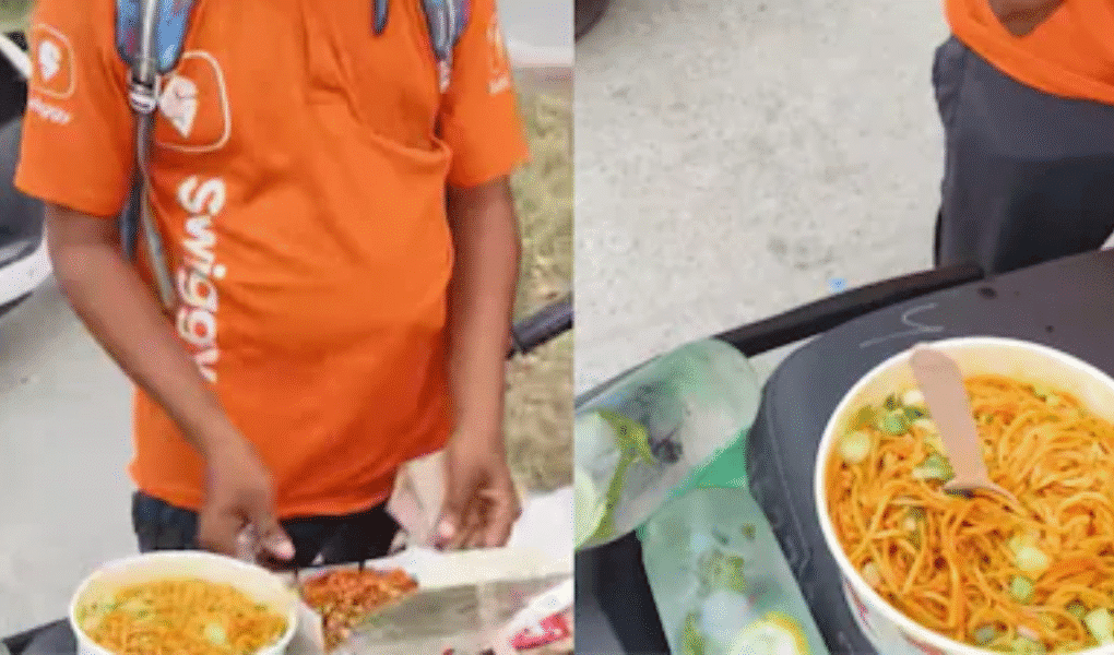 Clip of a viral video- swiggy delivery boy enjoys the zomato's cancelled meal.