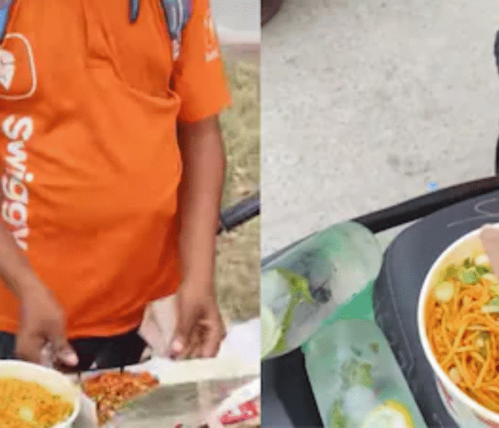 Clip of a viral video- swiggy delivery boy enjoys the zomato's cancelled meal.