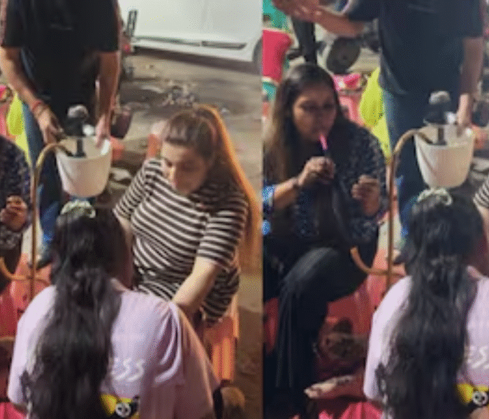 A Delhi Karwa Chauth video of women enjoying hookah while getting mehendi done turns viral, creating trending news across social media.