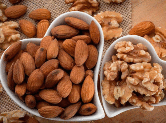 cup of dry fruits, almonds and walnuts
