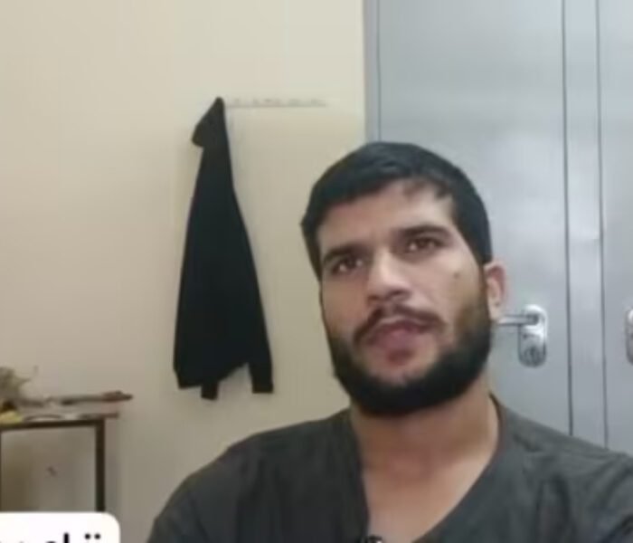 Close-up video still of **Umar un Nabi**, the alleged Delhi bomber, speaking in a room with a metal cupboard and a hanging jacket, discussing his extreme views on suicide bombings.