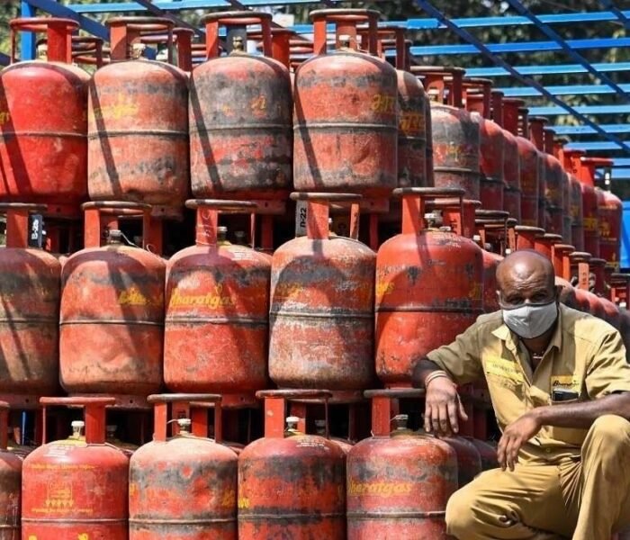 LPG cylinders stacked at distribution center as Delhi announces free LPG cylinder scheme for economically weaker households